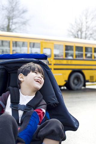 disabled boy and school bus